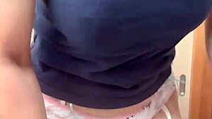 cute asian maid in bunny plug and lingerie plays with nipple accessories