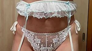 cute asian maid in bunny plug and lingerie plays with nipple accessories