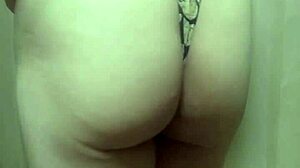 gorgeous gold leotard babe trains with long anal plug, wow!