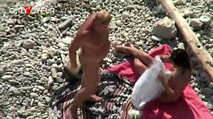 Beach voyeur slut wife gives head and fucks in public