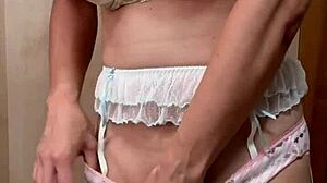 cute asian maid in bunny plug and lingerie plays with nipple accessories