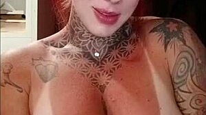 Fitness redhead with tattoos dedicates video to local viewers.
