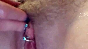 in my first shower video, this horny milf blonde sucks and uses dildo on her wet tits and big ass