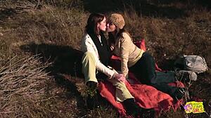 Two Brunettes Enjoy Lesbian Sex With Strapon On Hike