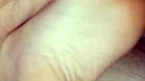 Homemade bare footjob with stockings, pantyhose, and toes for a big cumshot