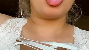 The blonde says, Check out my natural big tits in this closeup video.