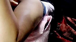 Melody Radford models a micro bikini on the beach