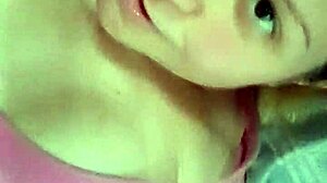 blonde woman invites video call from bed