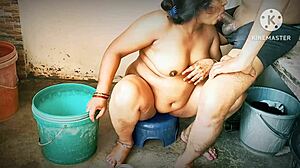 Desi Moms Sneak Bathroom Action with Horny Boys.