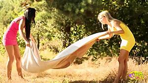 blonde and brunette babes share intense outdoor lesbian fingering