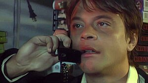 Gina Ryder rides cowgirl with big tits rocking hard