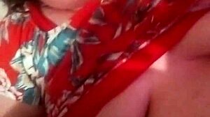 Step mom whispers, 'Johnny, give me that handjob with your big cum!' while teasing her big natural tits in homemade fetish sex.