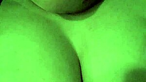 I'm sucking this lollipop while playing with my tits.