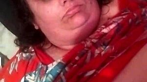 Step mom whispers, 'Johnny, give me that handjob with your big cum!' while teasing her big natural tits in homemade fetish sex.