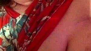 Step mom whispers, 'Johnny, give me that handjob with your big cum!' while teasing her big natural tits in homemade fetish sex.