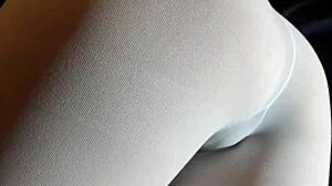 milf’s big firm ass sways in white pantyhose and heels.