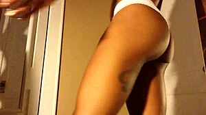 brunette ebony gropes cameltoe in lingerie