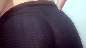 Her juicy buttocks in tight leggings