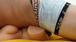 Young man fucks sex doll