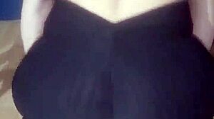 Her juicy buttocks in tight leggings