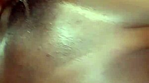 She feels intense pleasure enjoying the big black cock deep inside her.