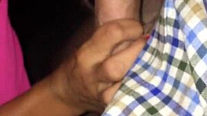 Mature tattooed blonde milf sucks petite young cock outdoors in public.