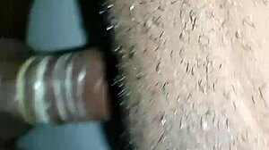 She feels intense pleasure enjoying the big black cock deep inside her.