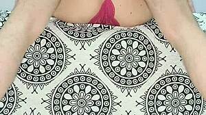 Milf teases in red lingerie with natural tits