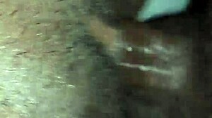 She feels intense pleasure enjoying the big black cock deep inside her.