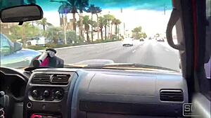 A couple enjoys road head on the bustling Las Vegas Boulevard with blowjobs and wet pussy action