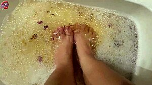 Washing feet with rose petals and herbs after a hard day!