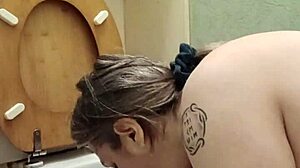 Look at this slave licking the toilets! So humiliating!