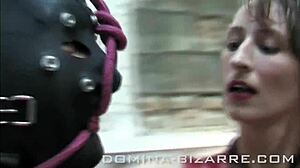 Darla is bound and masked in latex by german mistress in bdsm bondage