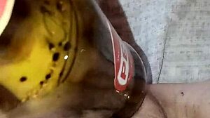 gretala rubs bottle on juicy pussy