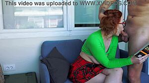 Reading a book while moaning from boyfriend's oral pleasure