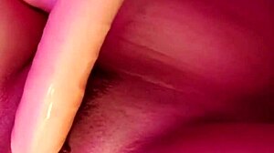 Latina amateur teases with big dildo masturbation