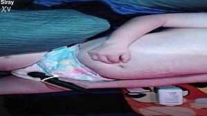 baby pup getting padded up in a diaper for some fun promo time, looking all cute and ready!