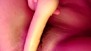 Latina amateur teases with big dildo masturbation