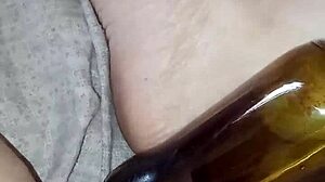 gretala rubs bottle on juicy pussy