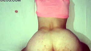 Here I am, bent over the blonde Latina with big ass, eating her pink vagina in bed