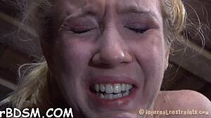 Does this restrained slave deserve punishment for her tight naughty pussy?