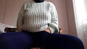 brunette masturbates riskily at office desk