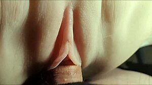 Slick moist pussy gets double penetrated in close-up