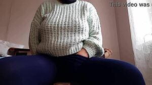 brunette masturbates riskily at office desk