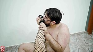 milf gives footjob to submissive backstage