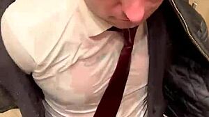 Men in leather suits play at the office