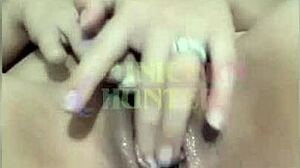 A curvy latina teen rubs her pussy then fingers her ass on the bed.