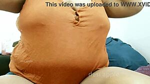 Tamil sexy aunty shows off big tits and boobs