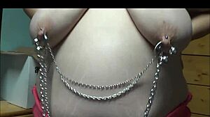 my double pierced wife looks hot in chains and barbells