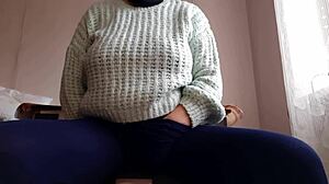 brunette masturbates riskily at office desk